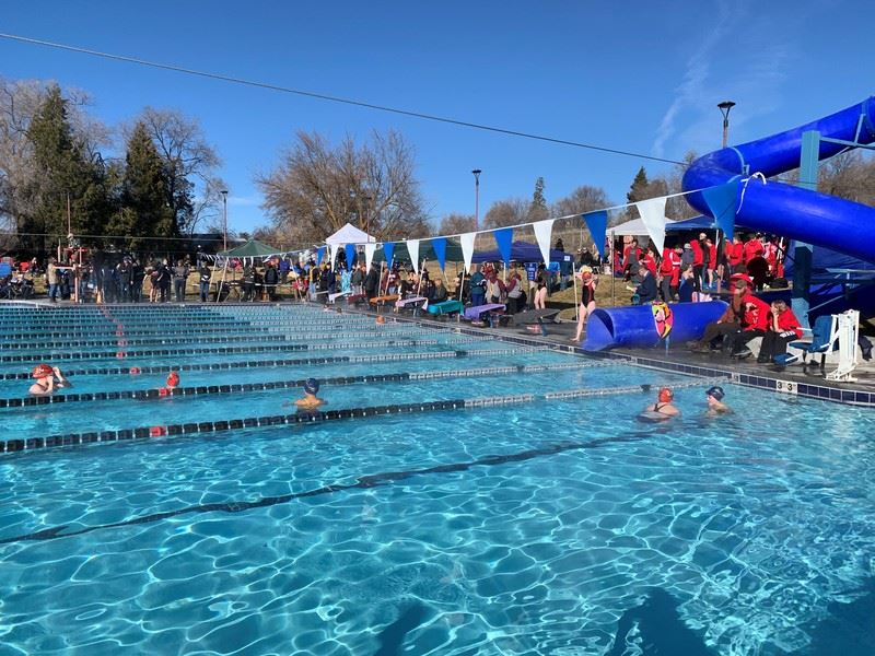 People swimming in the Ella Redkey Pool